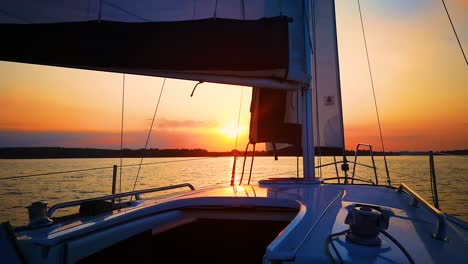 sailing boat in the mediterranean sea during scenic sunset