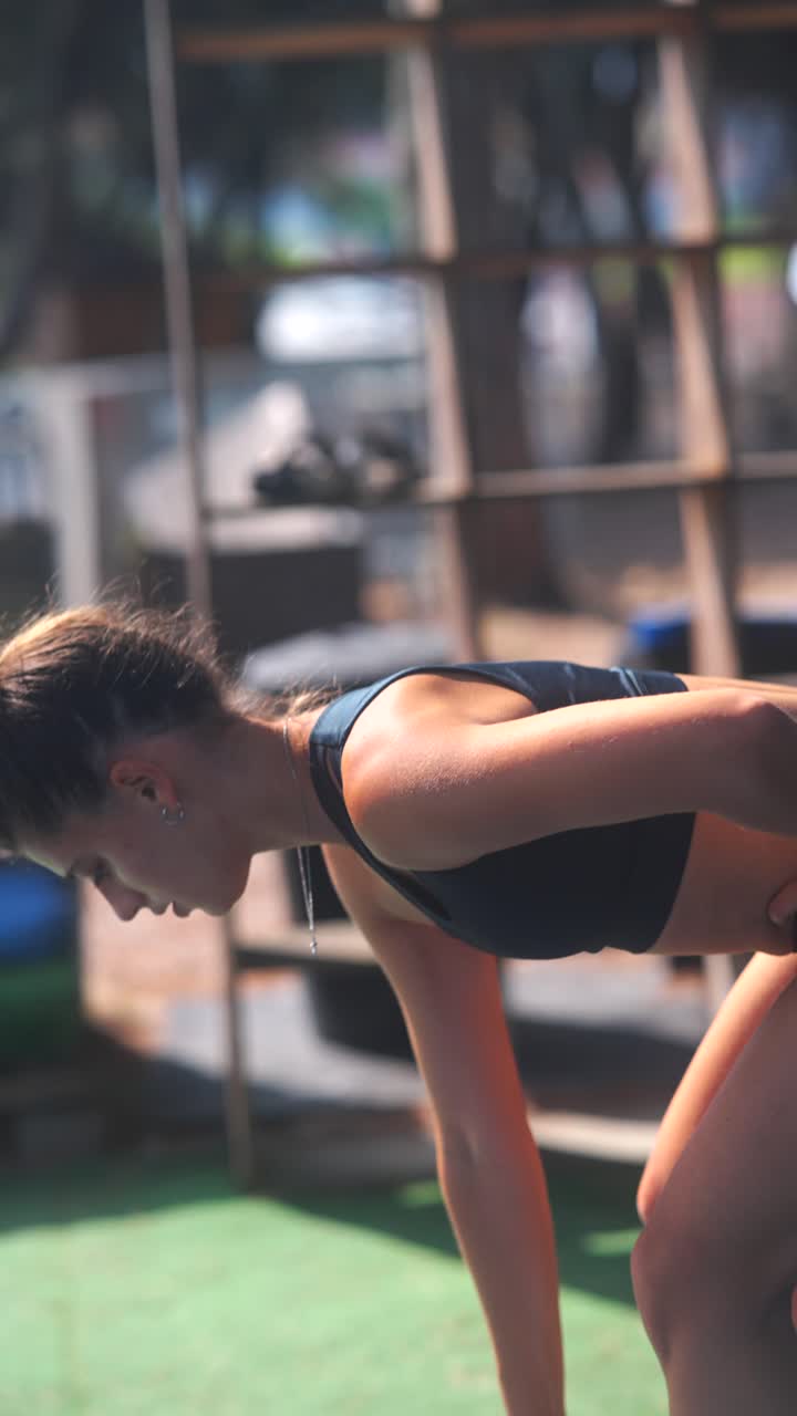 Woman Working Out with Kettlebell