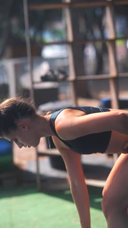 woman working out with kettlebell