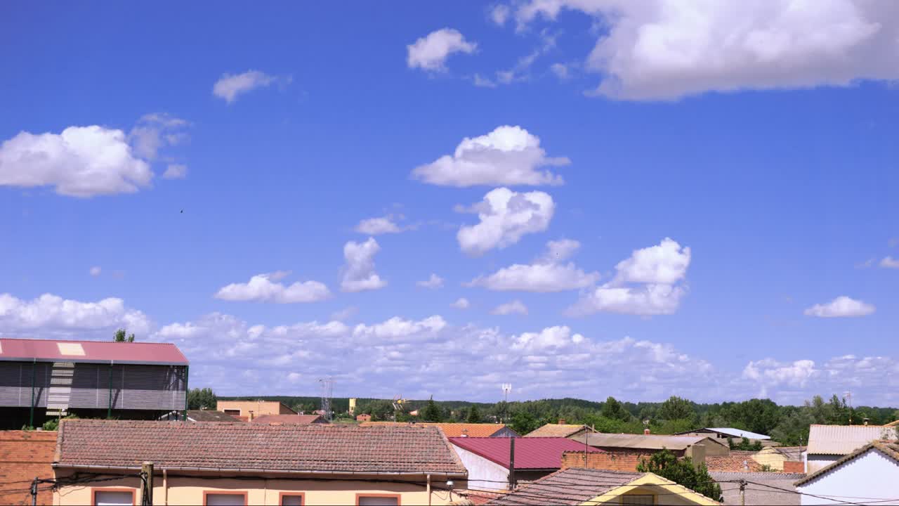 Time lapse of blue sky with clouds, in a Spanish town, called Arcos de la Polvorosa,