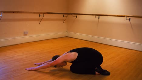 male dancer practicing a ballet dance