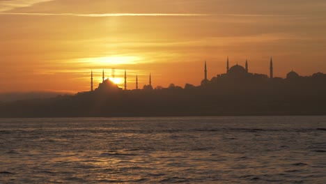 sunset over blue mosque and hagia sophia