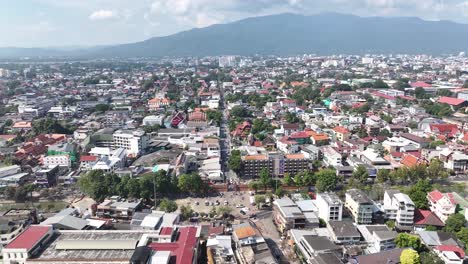 beautiful chiang mai drone cityscape with old town and mountain backdrop, thailand