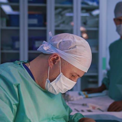teamwork of surgeons in the operating room. medical specialists perform plastic surgery in clinic. group of doctors during surgical procedure