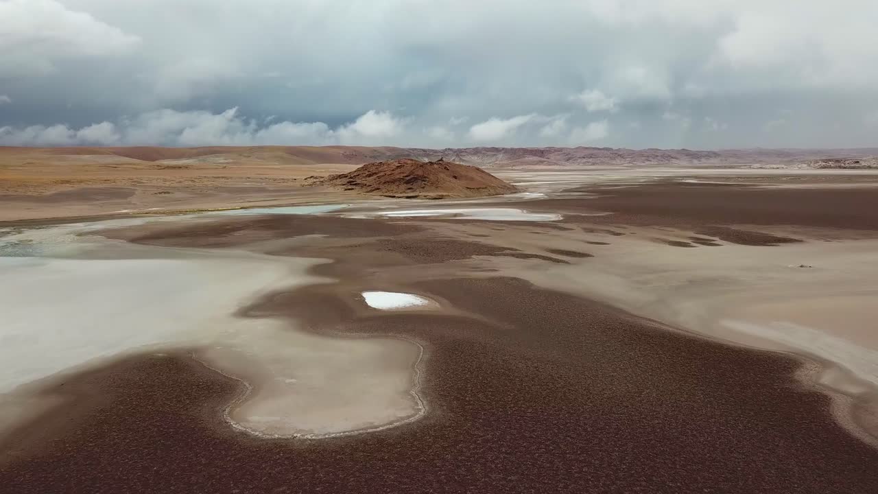 Los Flamencos National Reserve. Cinematic Aerial View of Salt Flats and Desert Landscape