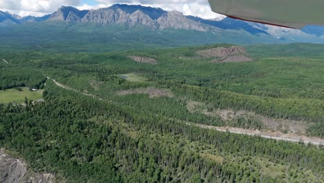 small airplane flight over the matanuska river in the talkeetna range west of palmer alaska
