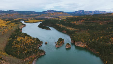 panoramic aerial view of the five finger rapids during autumn on the yukon river, yukon, canada.