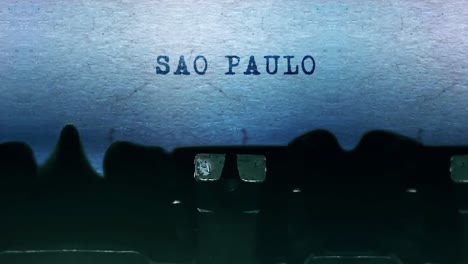 sao paulo word closeup being typing and centered on a sheet of paper on old vintage typewriter