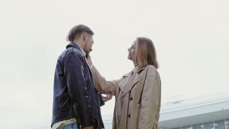 couple holding hands outdoors