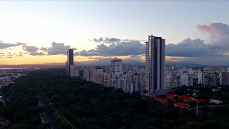 skyscrapers along anacaona avenue at sunset, santo domingo in dominican republic