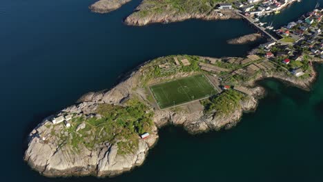 norway lofoten football field stadium in henningsvaer from above.