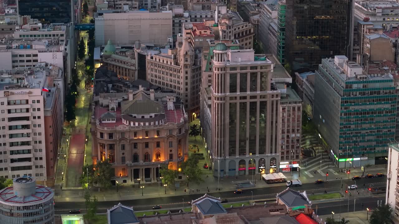 Aerial view of Santiago de Chile's iconic buildings on Nueva York Street, with the Club de la Union building and the Ariztia building at sunset