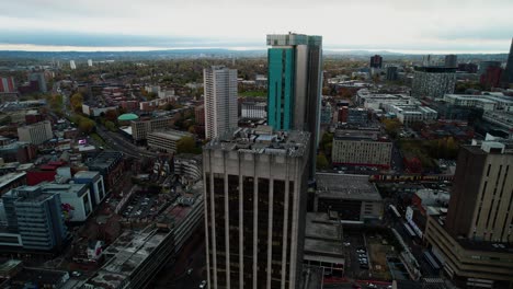 Descending-aerial-over-the-cityscape-of-Birmingham-in-the-Midlands-UK