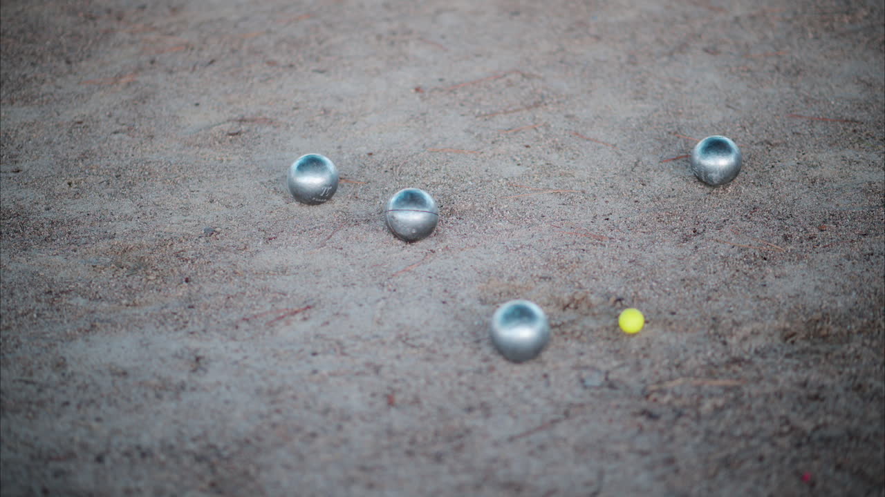 Close up of a marbles game on the beach