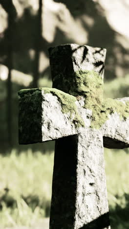 decaying grave monument among the greenery