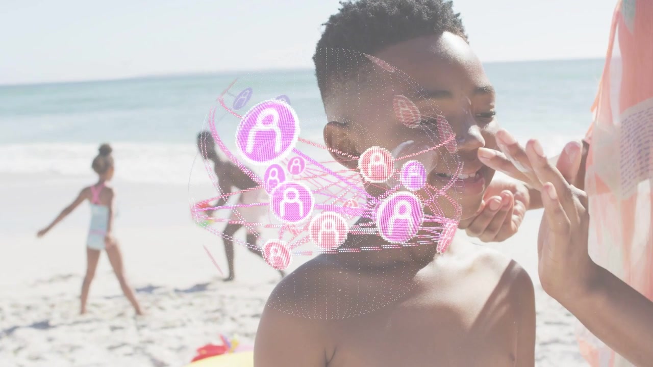 Woman applying sunscreen to boy's face, pink network appearing, orbiting and promoting sun safety