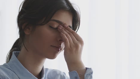 woman suffering from headache