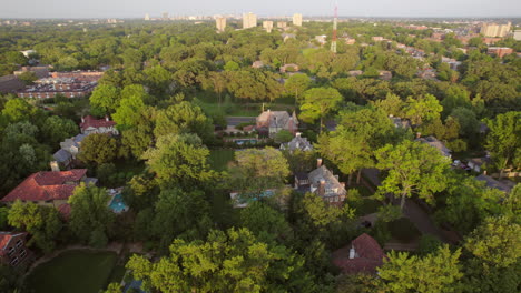 aerial pull back over a beautiful city neighborhood in st