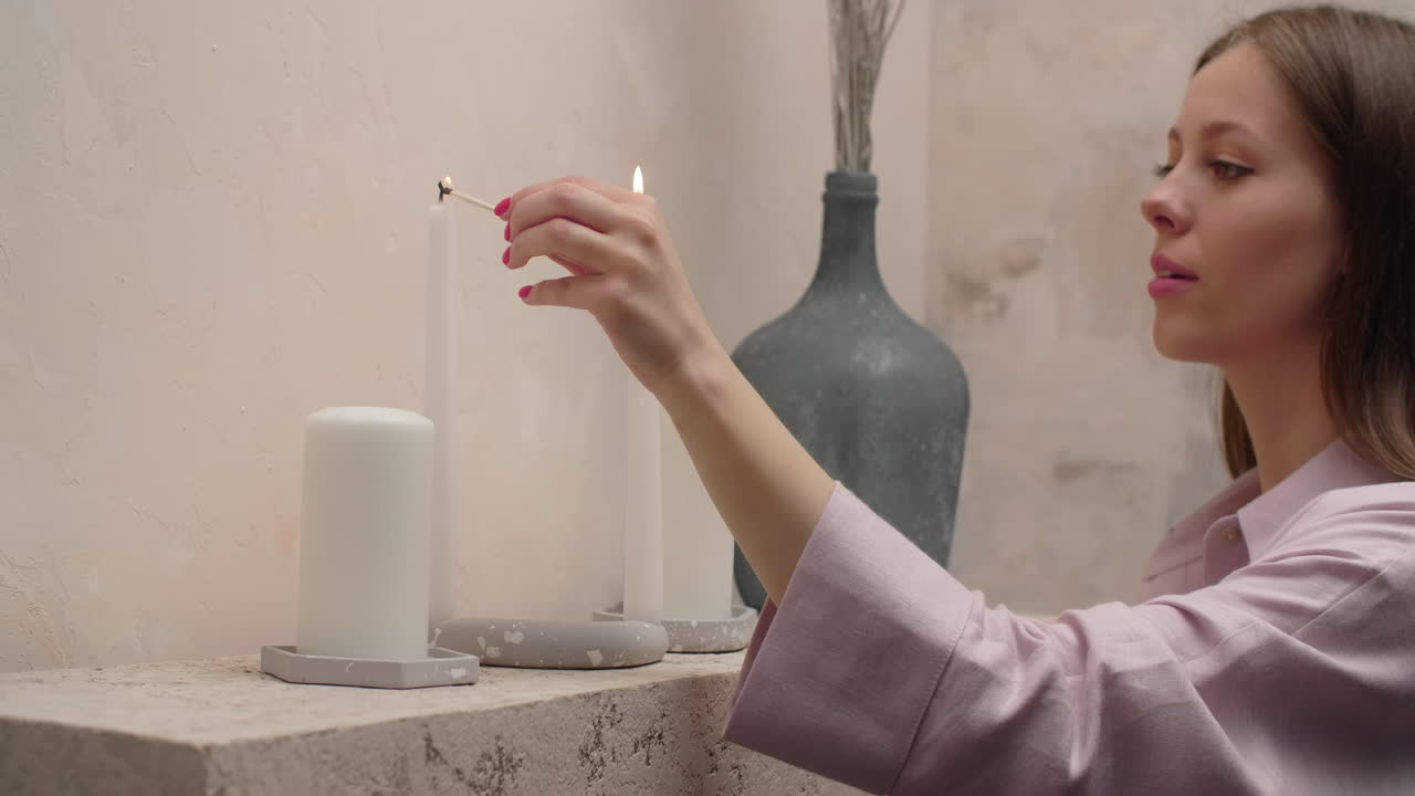 Woman Lighting Candles