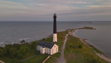 aerial drone view around the lighthouse at sõrve, saaremaa island in estonia.