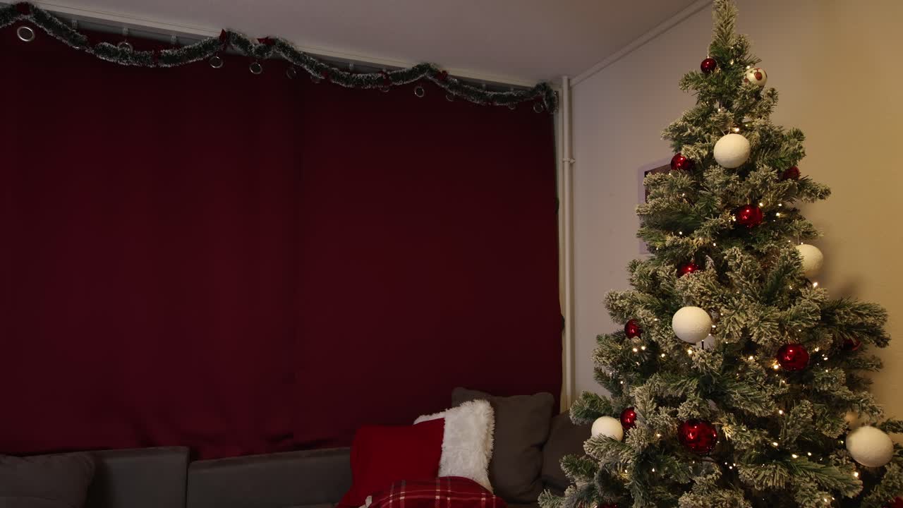Living room decorated with Christmas tree, holiday home decorations wide