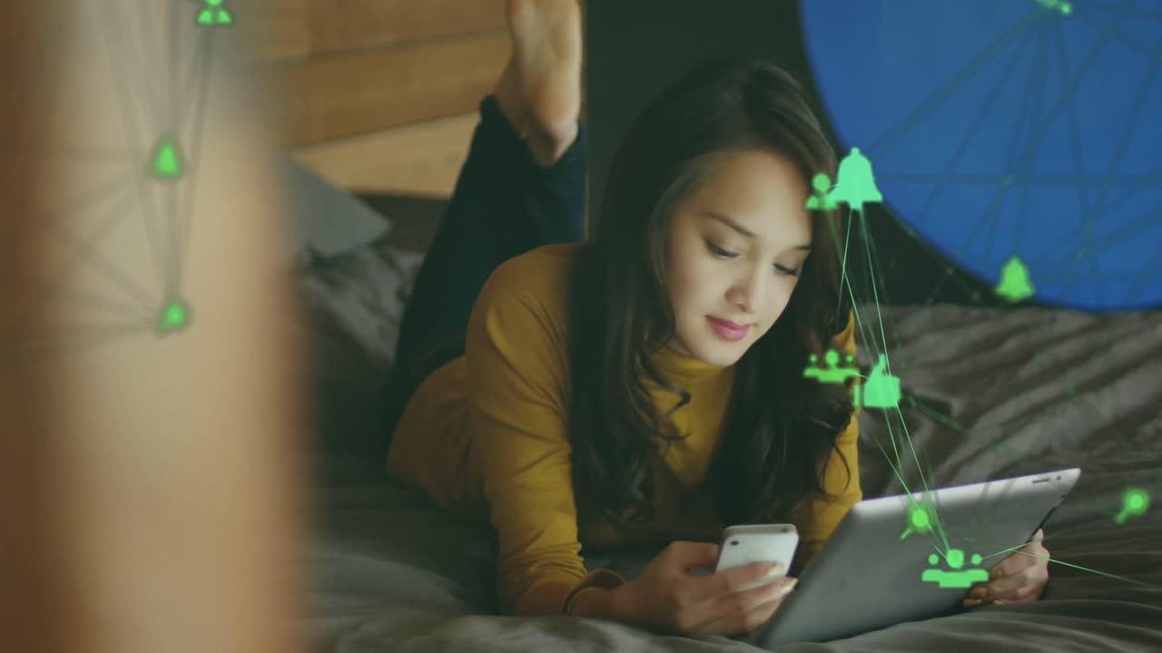 Animation of media icons over happy caucasian woman using tablet