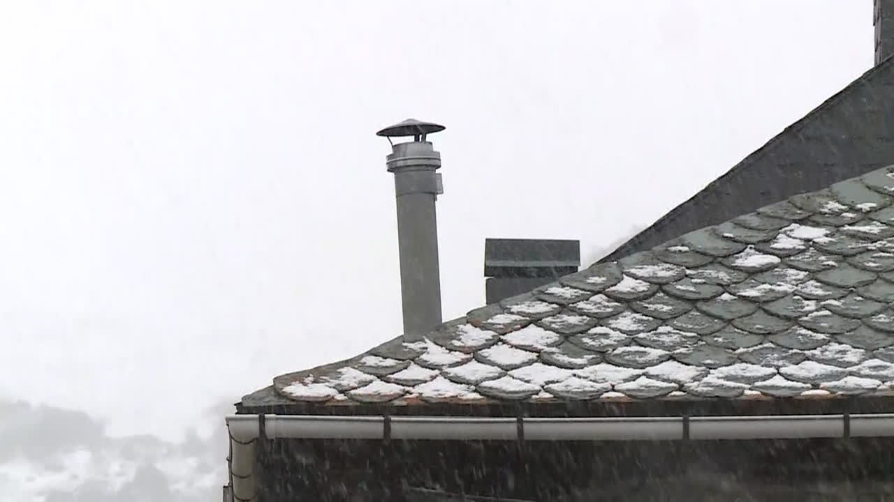 Snowy Roof in a Mountain Village