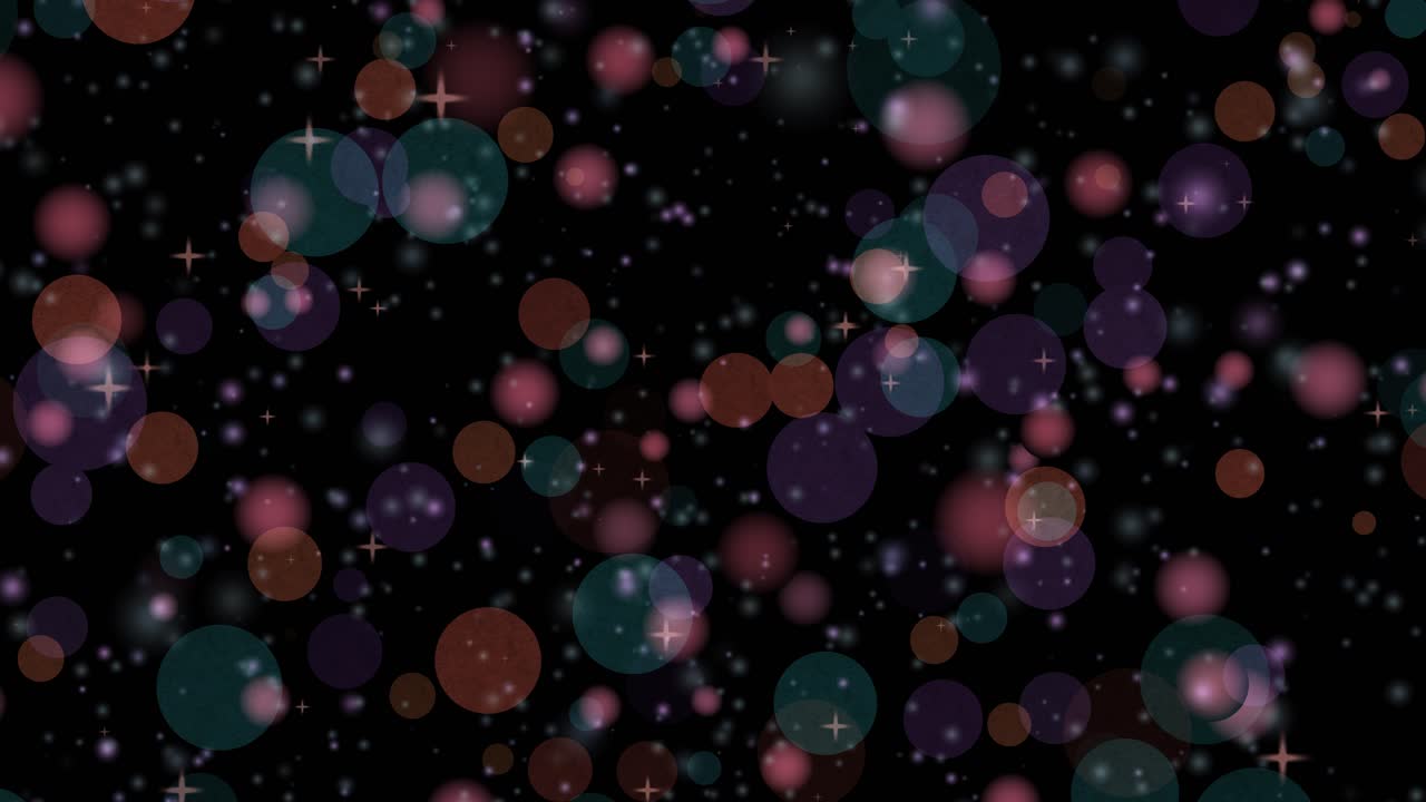 Myke, flerfargede bokeh-sirkler og små stjerner faller vertikalt gjennom et mørkt, svart arbeidsområde