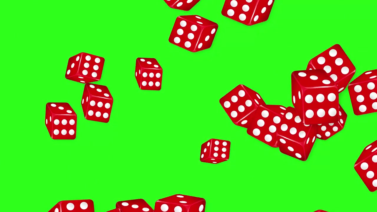 Dadi da gioco rossi esplodono e cadono nell'aria su uno sfondo a schermo verde