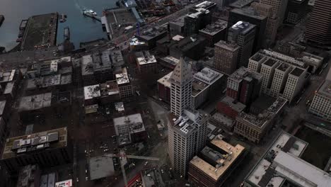 aerial of seattle's iconic smith tower and the surrounding pioneer square neighborhood