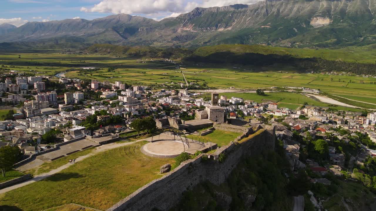 Aerial panoramic view of Gjirokaster Castle and Clock Tower, showcasing the Ottoman architecture in Albania
