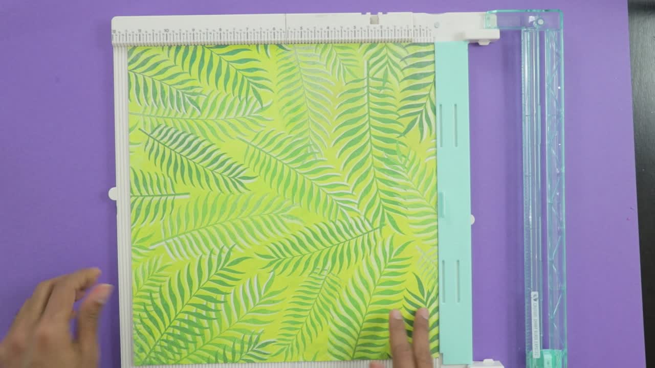 Making fold marks on patterned paper with score board tool