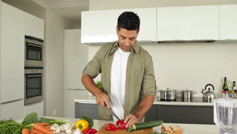 Handsome-man-chopping-vegetables