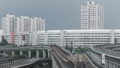 singapore cityscape with train tracks and buildings