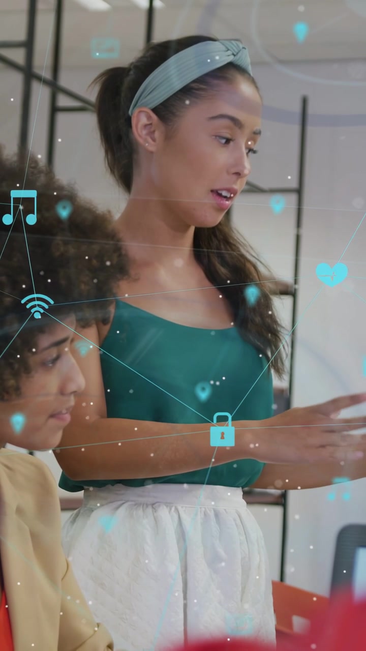 Vertical video: Woman starting office pitch holding paper while icons floating around hue shifting