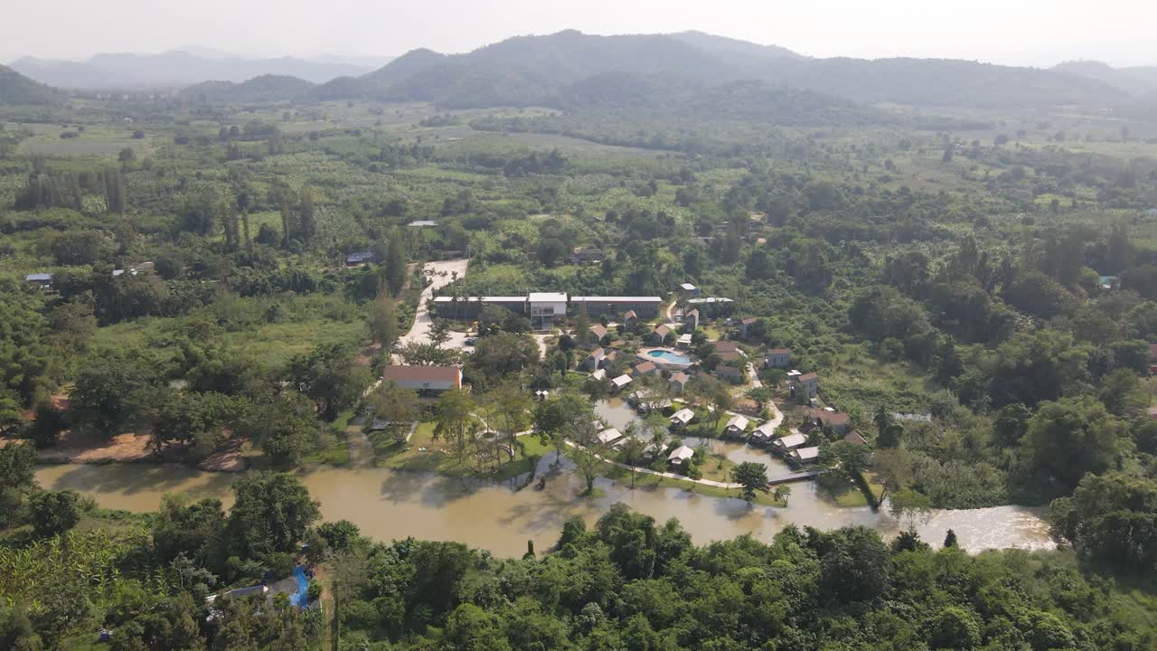 4K Aerial Drone Footage of a Hotel Resort with Riverside Views in Phetchaburi Province, Thailand.