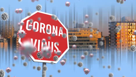 animation of coronavirus text on stop road sign over covid 19 cells and cityscape