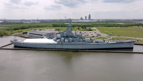 USS-Alabama-battleship-in-Mobile,-Alabama-with-drone-video-moving-right-to-left