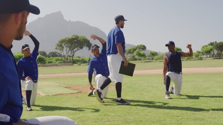 Giocatori di baseball che fanno stretching insieme