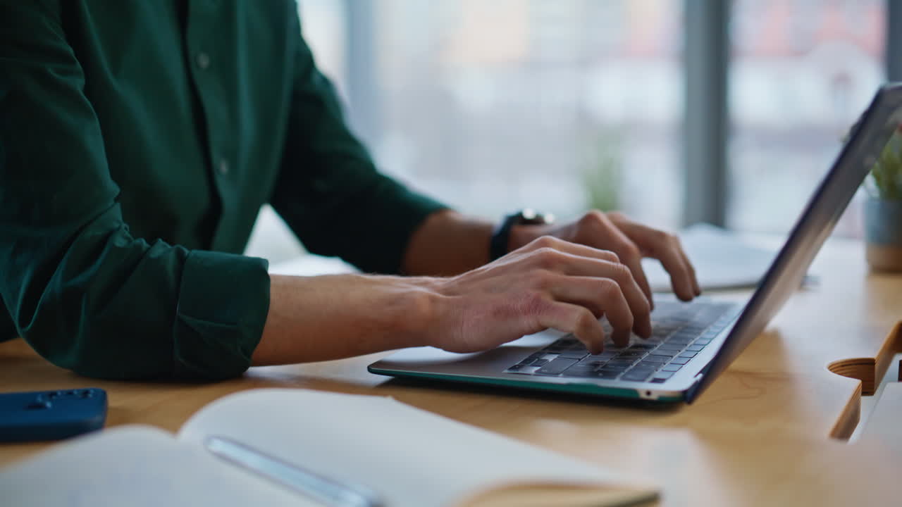 Manager hands writing notebook creating business project at workplace closeup