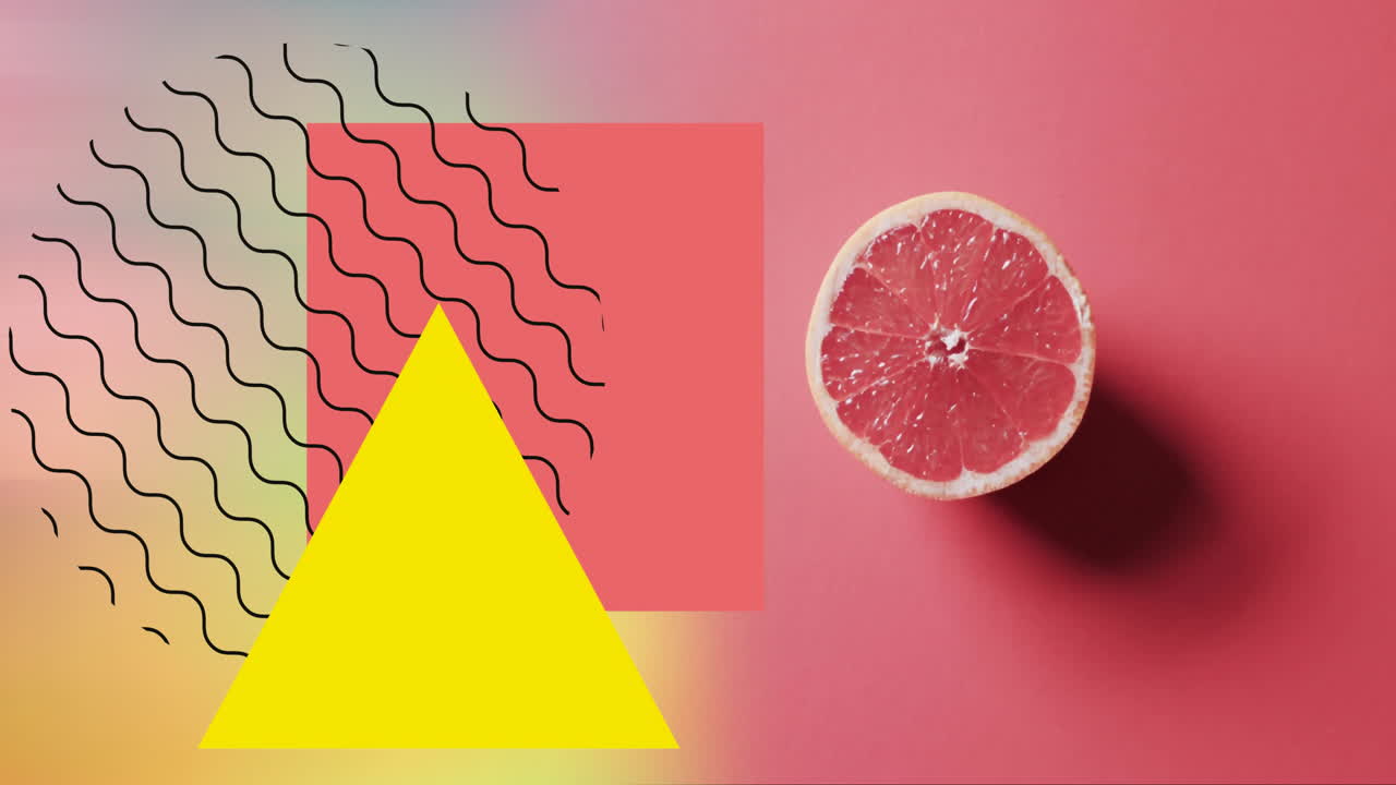 composición de pomelo dividido en dos y formas abstractas sobre fondo rojo