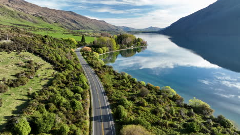 lake wakatipu road towards kingston from queenstown, new zealand south island