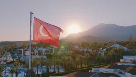 turkish resort at sunset with turkish flag