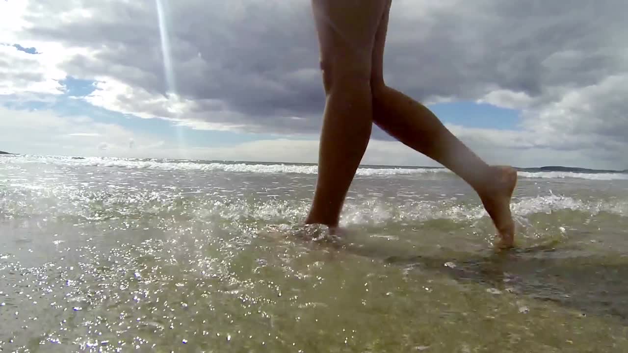 Woman paddling in the sea