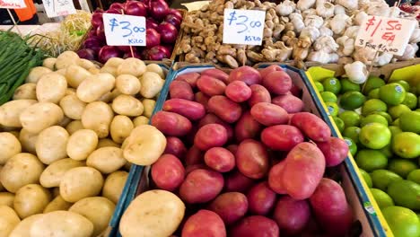 various vegetables displayed at market stalls