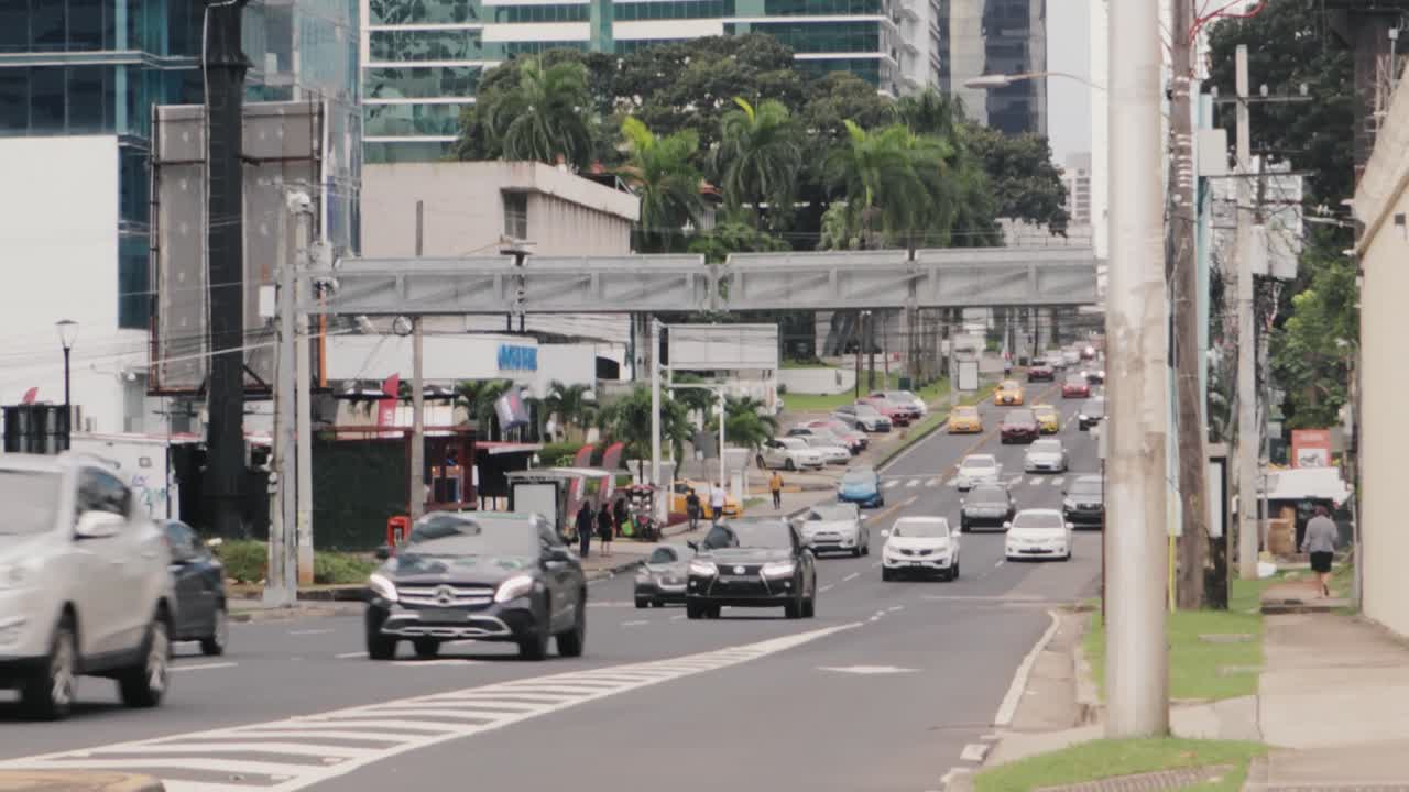 The flowing traffic of a busy road as commuters make their way home from a days work to their suburban residence, Panama City