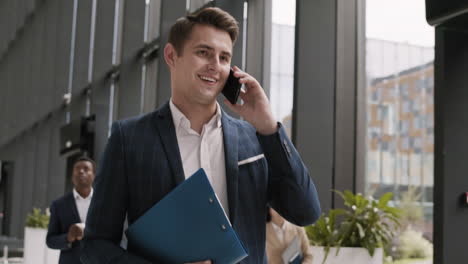 handsome businessman having phone call