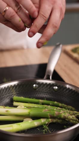 cooking asparagus in a pan