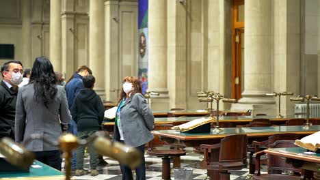 group of people in the gabriela mistral reading room, national library of chile on heritage day
