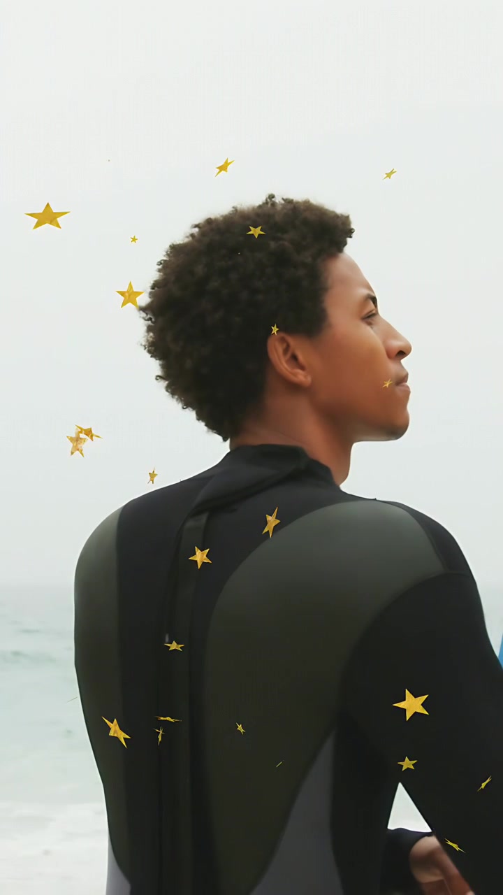 Vertical video: Surfer steadying incoming board, gold stars drifting around him, sports prep